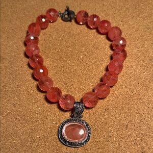 Elegant Pink Beaded Necklace with Silver Pendant